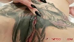 Watch marie bossette getting an extreme tattoo on her clit