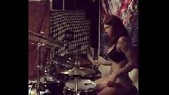 Felicity feline drums in her undies at home