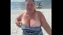 Slutty bbw duca wife flashes her big tits on a public beach